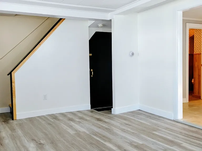 Three way light switch up the stairs.
Spacious living room is sheer elegance!