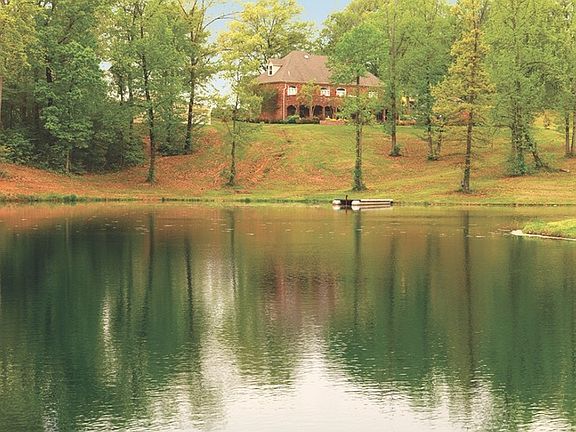Pond
						:
						View from pond towards the back of the house.