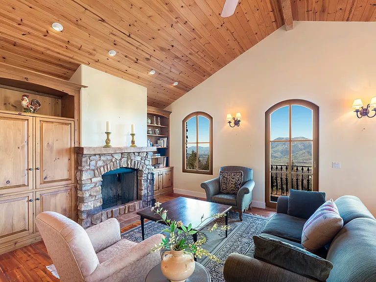 Guest house living area with TV inside cabinet