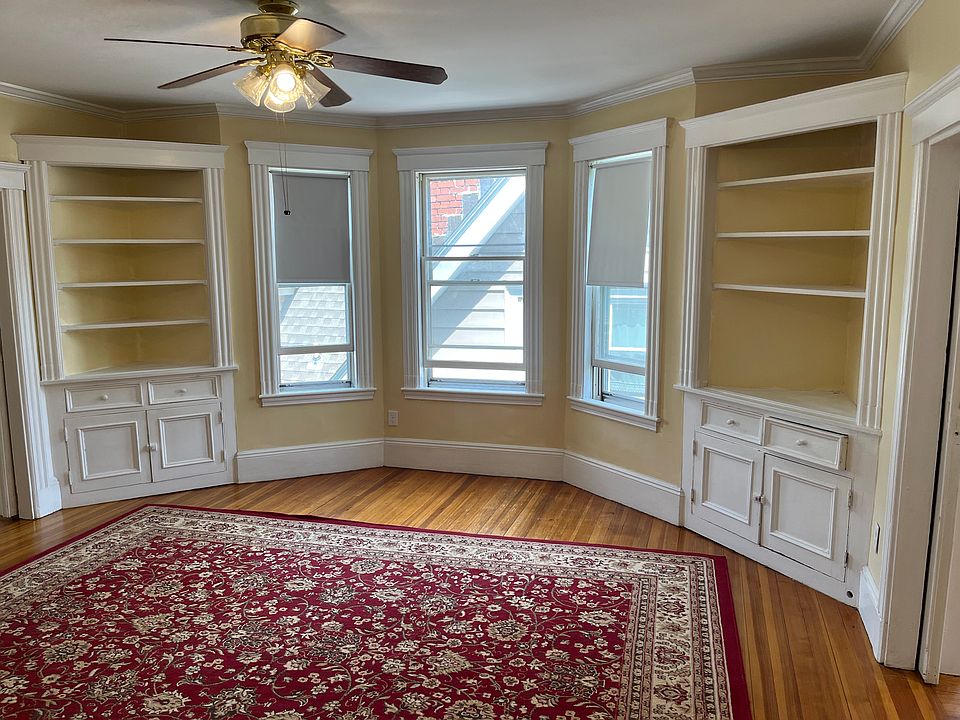 Pocket doors open to huge dining room with built in cabinets
