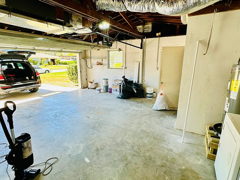 Big 2 car garage with bonus work room