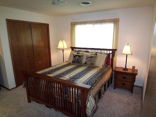 bedroom with walk in closet.
