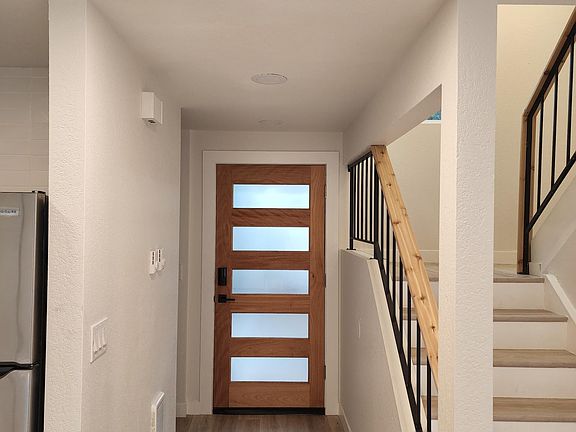 Beautiful custom cedar railing and front door