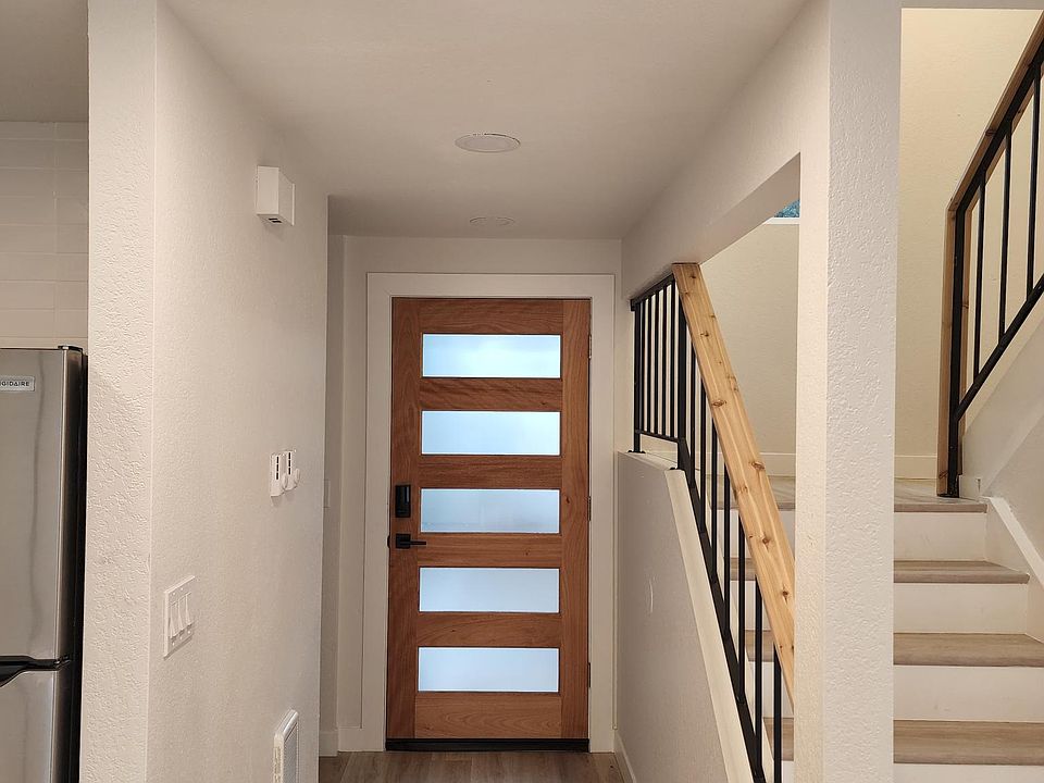 Beautiful custom cedar railing and front door