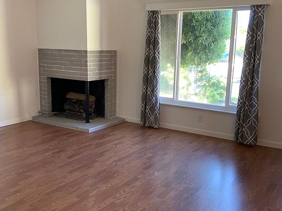 Living room features a fireplace