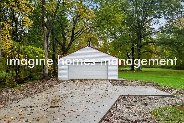 7447 Stearns Rd — Photo 15