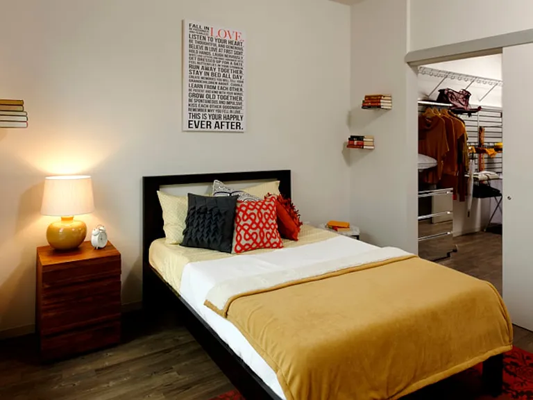 Urban bedroom with hard surface flooring