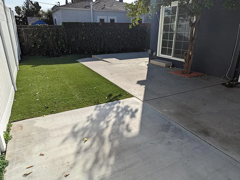 Pet turf area and Primary bedroom slider door
