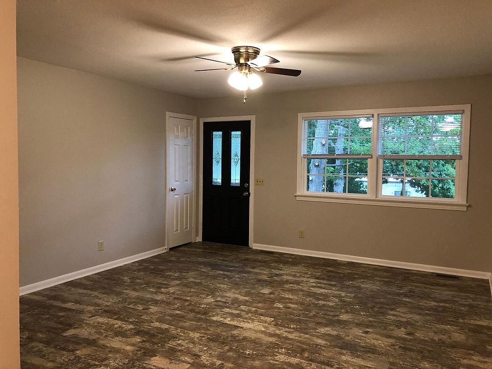 Living room has coat closet by front door.