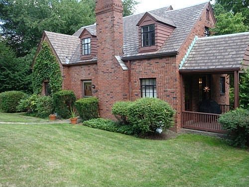 Front view with covered side porch