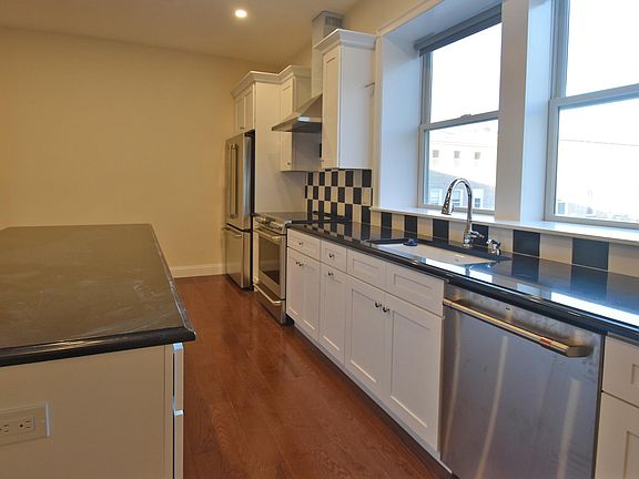 Large working kitchen with island and plenty of counter space