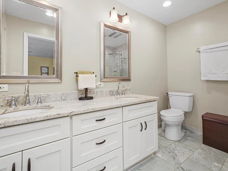 Updated bathroom. Marble tiles.