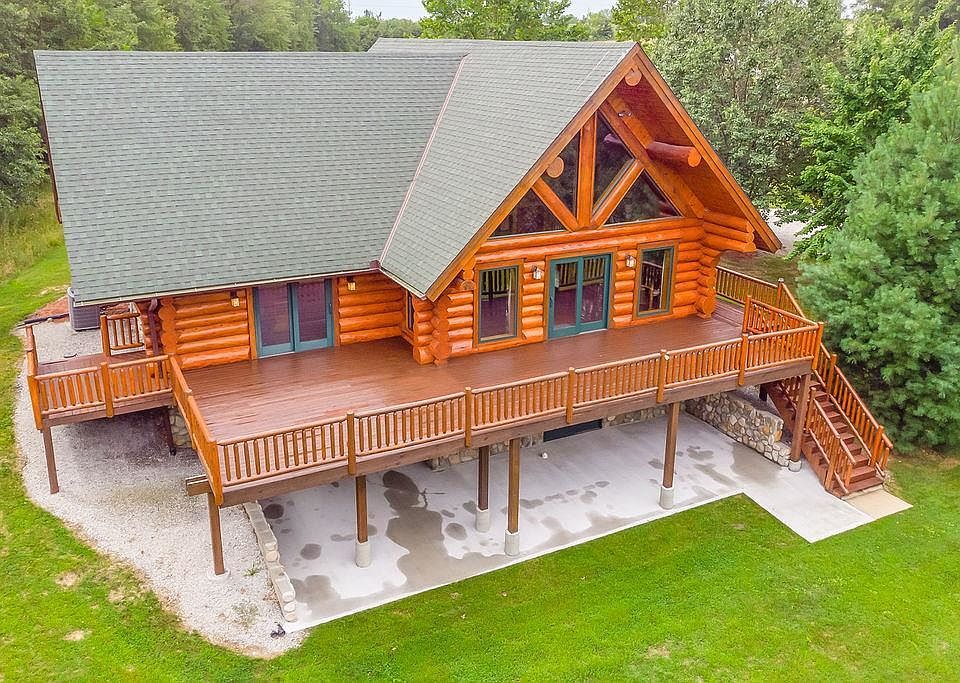 Custom Crafted Log Home, 3800 sqft., with 1000 sqft. of deck and 600 sqft. of covered patio