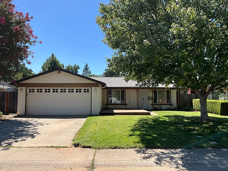 8830 Woodman Way — Photo 1