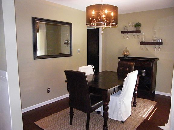 Dining room
						:
						Hardwood floors, large window, wood blinds