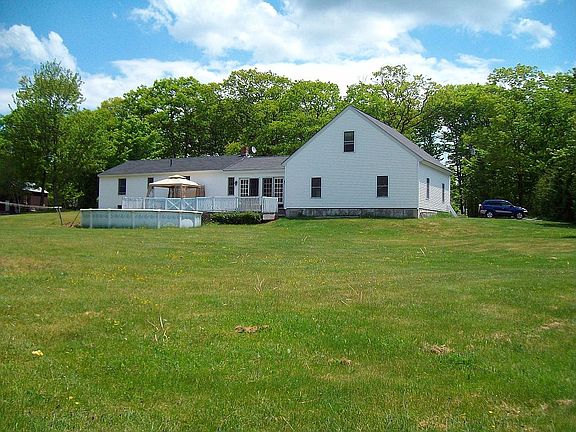 Spacious back yard abutts woods