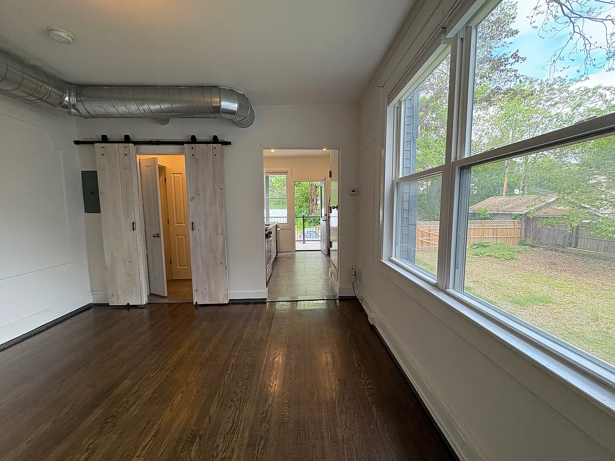 Living Room with Bath (l) and Kitchen (r) - 514 State St #2