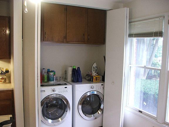 Washer and dryer closet located in the kitchen