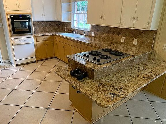 Kitchen with granite counter