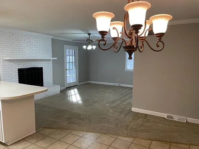 Dining area in kitchen overlooking family room