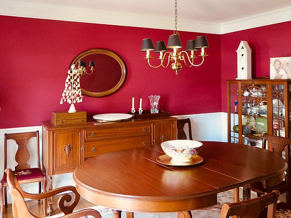 Dining Room to the left of foyer and center hallway.