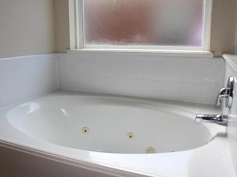 Relax in the lovely spa tub in the master bath