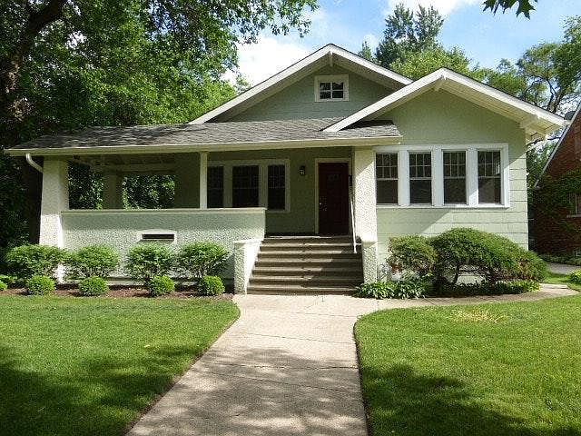 Charming curb appeal- huge sitting porch