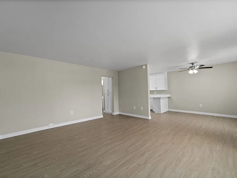 Apartment living space and dining room at Strada Apartments in Orange, CA