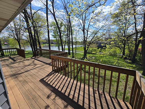 Rear deck with bass lake access