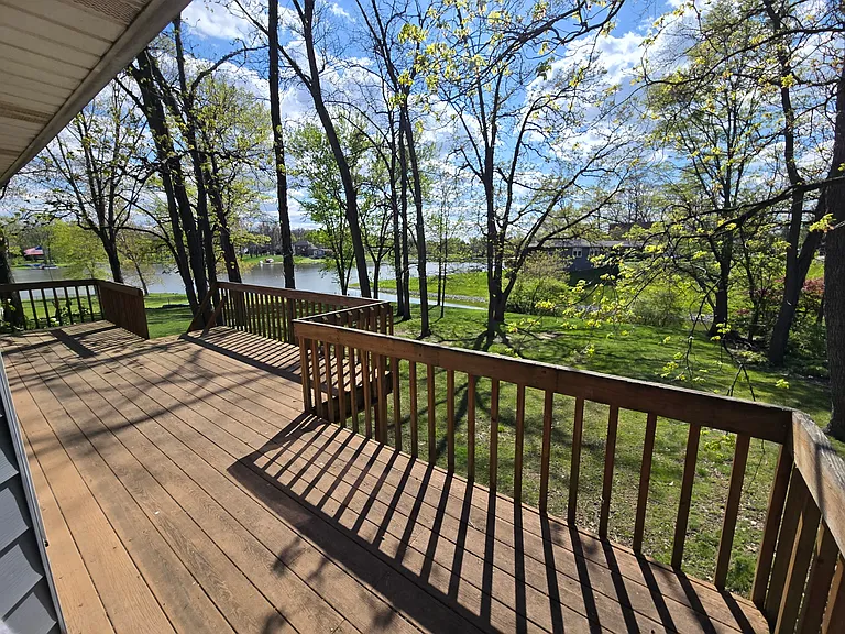 Rear deck with bass lake access