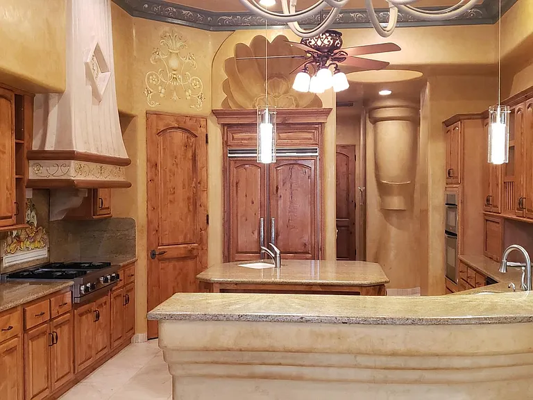 Kitchen with all kinds of unique wall and ceiling design
Full size Pantry, Island, Bar, Viking gas stove