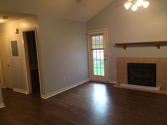 picture of living area + bathroom