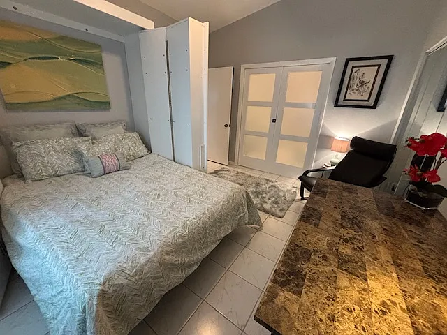 Queen Murphy bed for your grandkids or extra guests! Simply fold down the bed!
