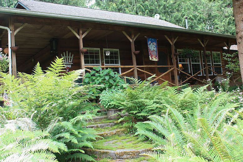 Relax and watch the wildlife from your covered wrap-around porch. 