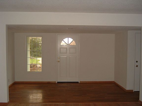 in living room looking toward front entrance