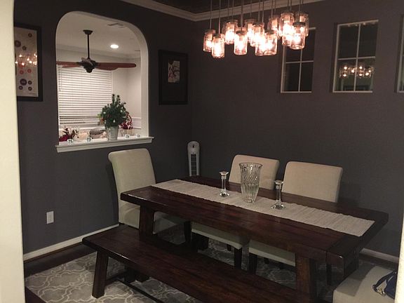 View from dining room with living room through cutout