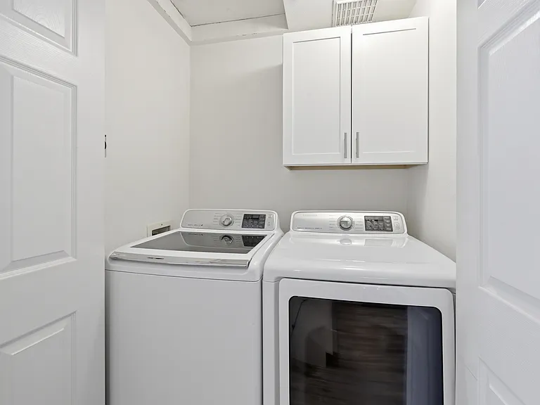 Newer full size washer and dryer in unit.