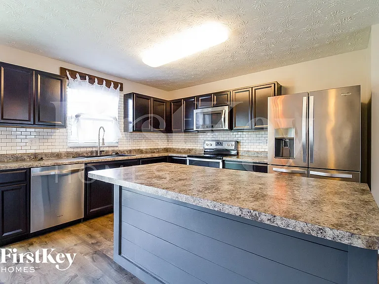 6156 Woodville Dr — Photo 6