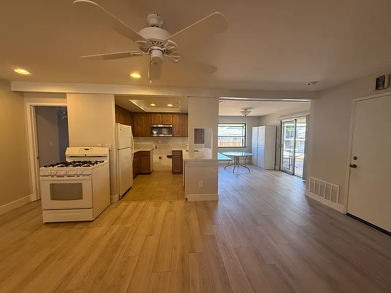 View from dining room of kitchen and alcove (oven will be placed back once the counters are complete)
