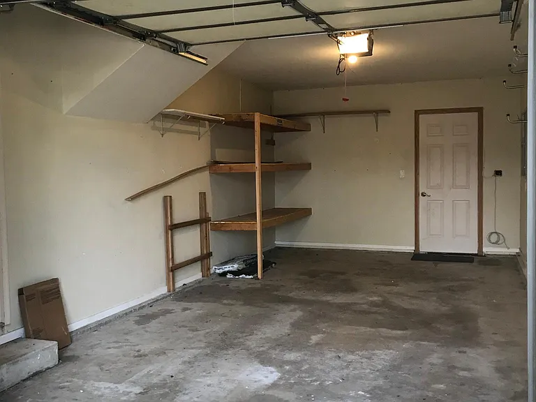 Fairly Deep 1 Car Garage w/ Storage/Shelving