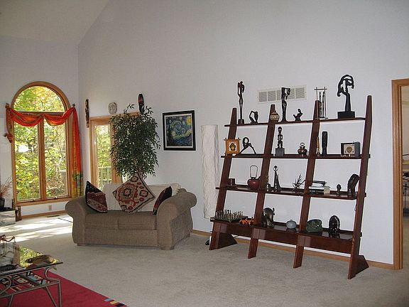 Spacious Living room with wonderful view of wooded lot