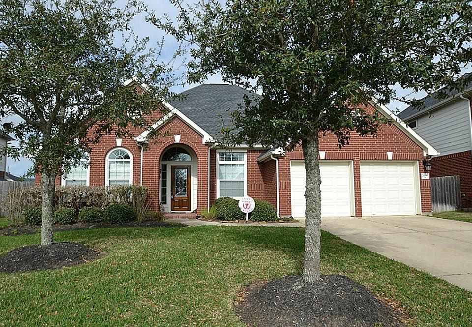 Front view of this outstanding home located at 28046 Wind Hawk Dr.