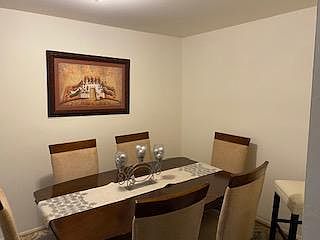 Dining Room (8 feet x 13 feet) with pergo floors.