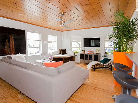 Open concept living room including a reading nook, plenty of room to relax and unwind!