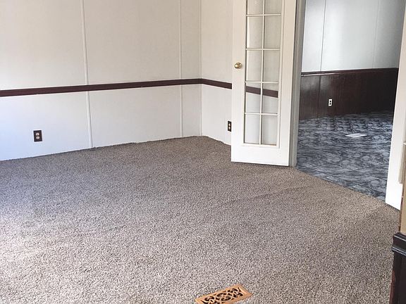 Livingand showing a little of family room floor