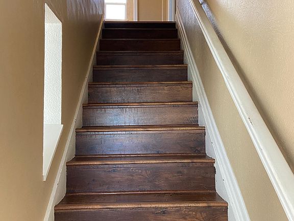 Stairs and bathroom at the top