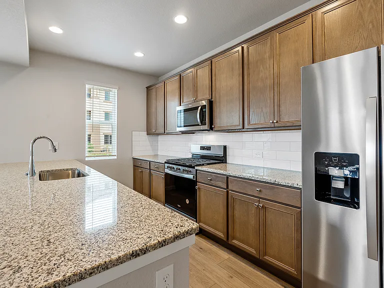 Greenways at Sand Creek Townhomes — Photo 28