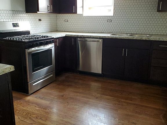 2nd image of 6056 W Eastwood Ave #2