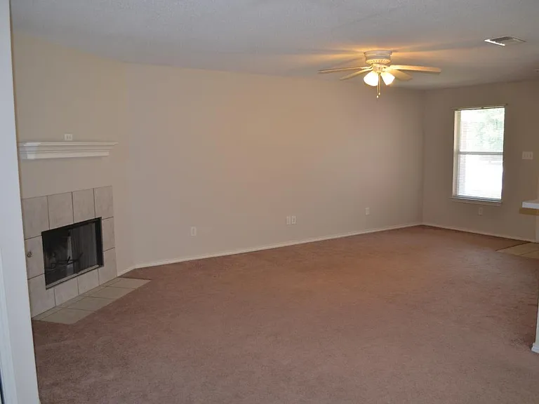 Extra large living area with cozy fireplace