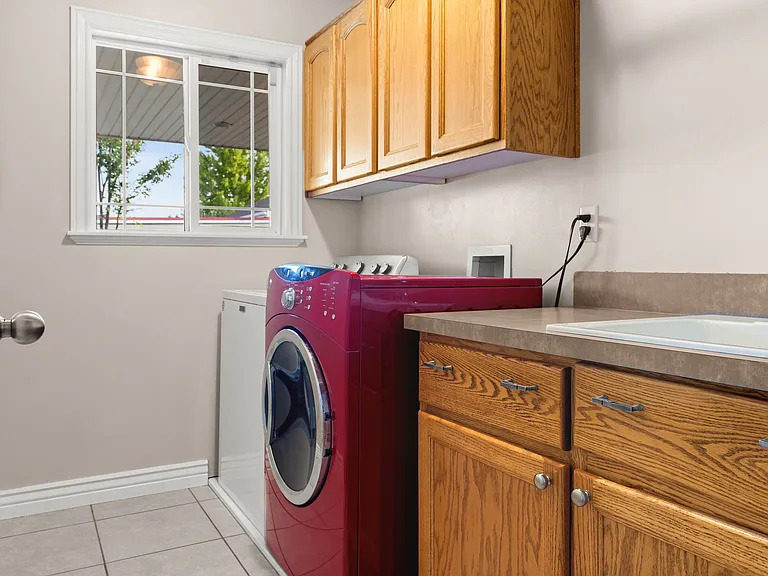 Laundry room across from upstairs bathroom